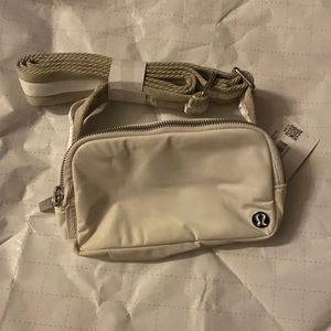 Lululemon belt cross body bag in raw linen/white